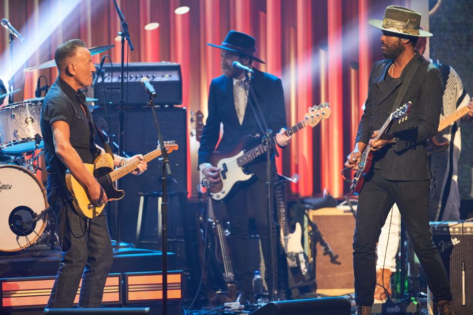 Bruce Springsteen (left) and Gary Clark Jr. trade licks on "Come Together" at the 23rd annual Kennedy Center Mark Twain Prize for American Humor honoring Jon Stewart on April 24.