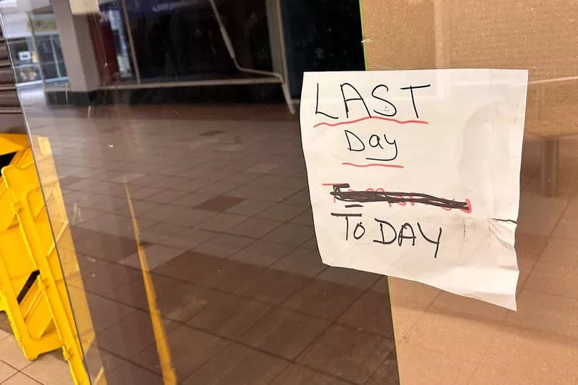 'Last Day' sign on shop in Bootle Strand