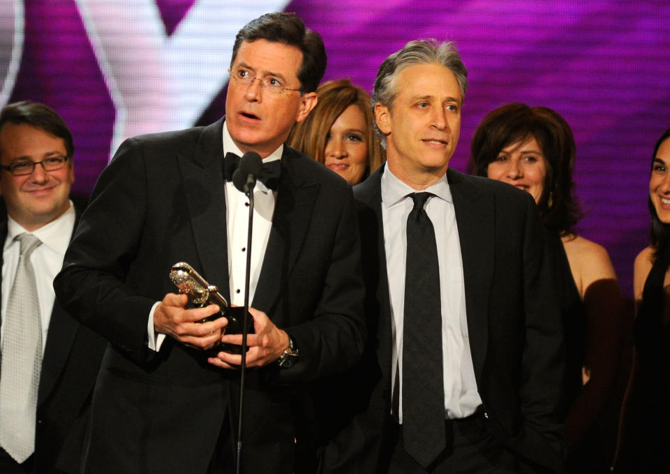 NEW YORK, NY - MARCH 26:  Stephen Colbert and Jon Stewart speak onstage at the First Annual Comedy Awards at Hammerstein Ballroom on March 26, 2011 in New York City.  (Photo by Dimitrios Kambouris/Getty Images)