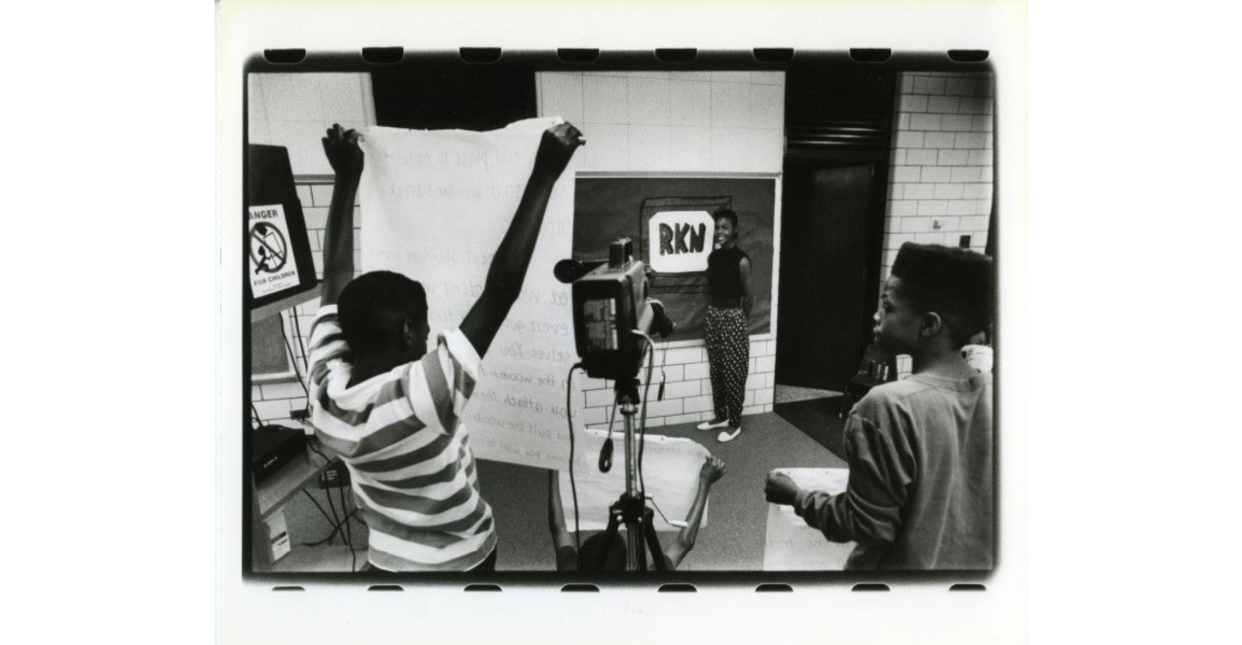 In this file photo, Rankin student Julia Johnson is taped while other students hold her cue cards for a video about their summer school experiences.