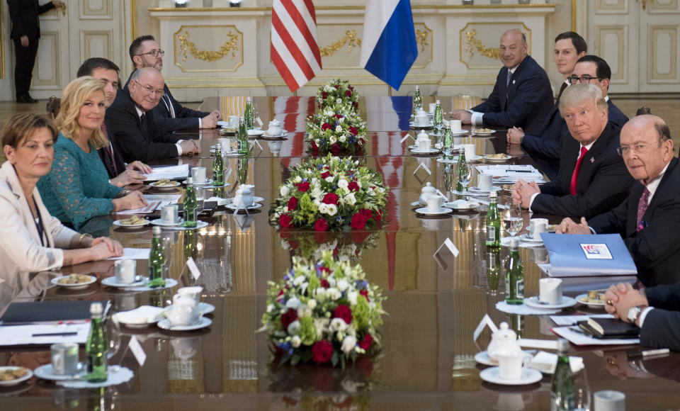 Trump and Croatian President Kolinda Grabar-Kitarovic (second on the left) hold a meeting at the Royal Castle in Warsaw.