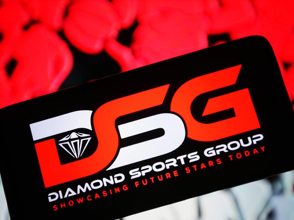 In this photo illustration, Diamond Sports Group LLC logo is seen on a smartphone screen