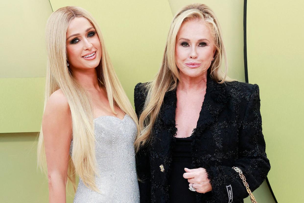 US socialite Paris Hilton and her mother Kathy Hilton arrive for the Versace Fall/Winter 2023 fashion show on March 9, 2023, at the Pacific Design Center in West Hollywood, California.