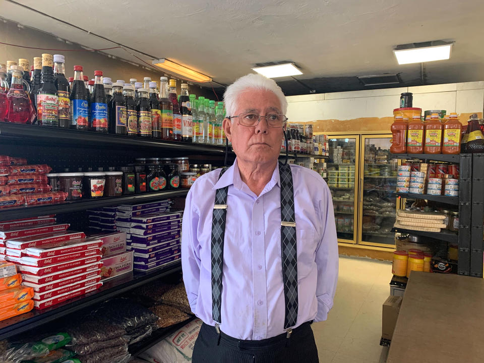 Sharief Hadi inside Ariana Halal Market & Cafe. Hadi is the brother of shooting victim Mohammad Zaher Ahmadi. (Alicia Lozano / NBC News)