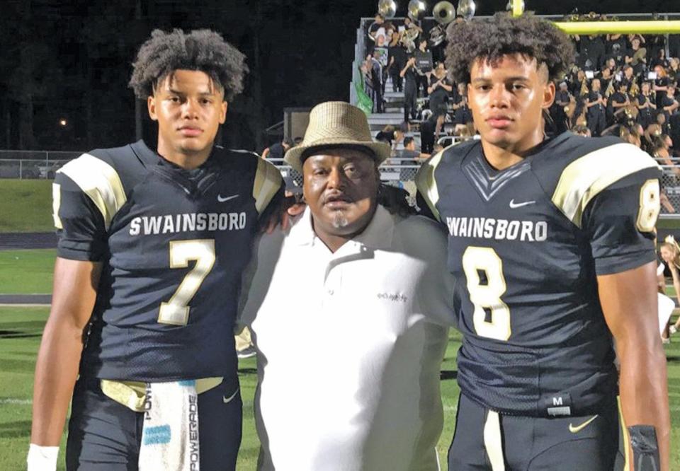 Cedrick Seabrough (left) and Fred Seabrough (right) with their father Fred Seabrough Sr.