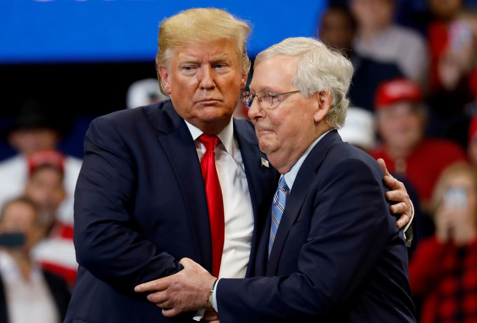 President Donald Trump and Senate Majority Leader Mitch McConnell aren't just embracing each other awkwardly at this rally in Nov. 2019. They have embraced each other's joint cause of remaking the federal courts as much as possible before Trump potentially loses reelection in Nov. 2020. (Photo: Yuri Gripas / Reuters)