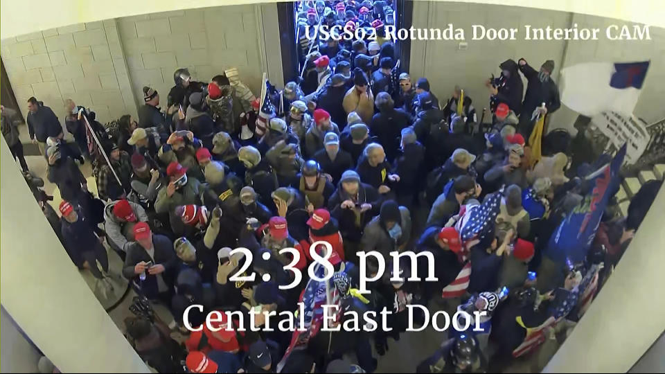 This image from video from a police worn body camera from the Jan. 6 riot at the U.S. Capitol, was played as a committee exhibit as the House select committee investigating the the Jan. 6 attack on the U.S. Capitol, held a hearing Thursday, June 9, 2022, on Capitol Hill in Washington. (House Select Committee via AP)