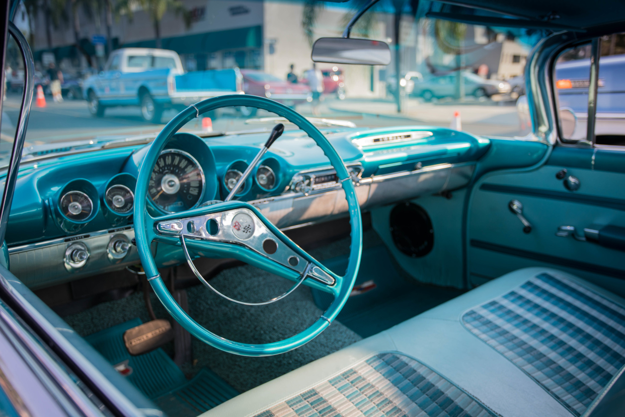 Bench Seat and Metal Dashboard of a Vintage 1959 Chevrolet Impala