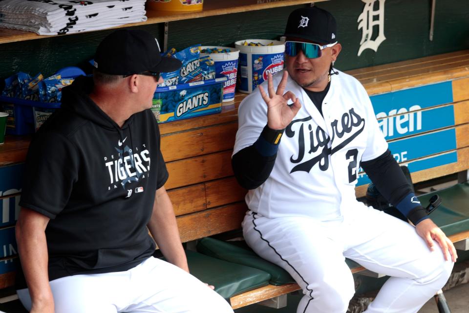 Detroit Tigers manager A.J. Hinch and Miguel Cabrera talk in the dugout before game action on Fiesta Tigres between the Detroit Tigers and the Tampa Bay Rays at Comerica Park in Detroit on Saturday, August 5, 2023.