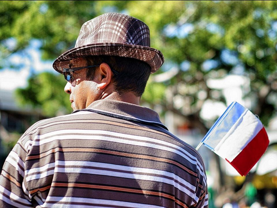 Man Holding French Flag