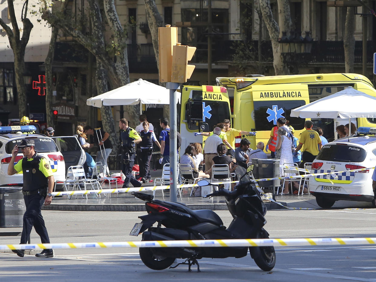 An armed police operation is underway and residents have been told to steer clear of the city's Placa Catalunya: AP