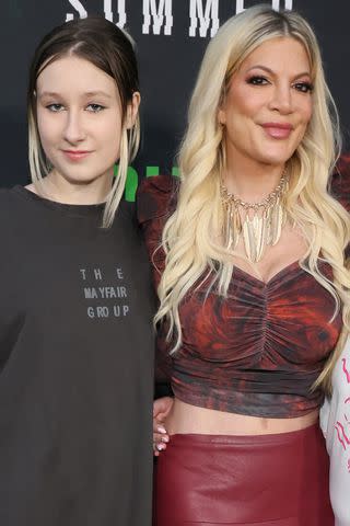 <p>Rodin Eckenroth/FilmMagic</p> Tori Spelling and daughter Stella in May 2023