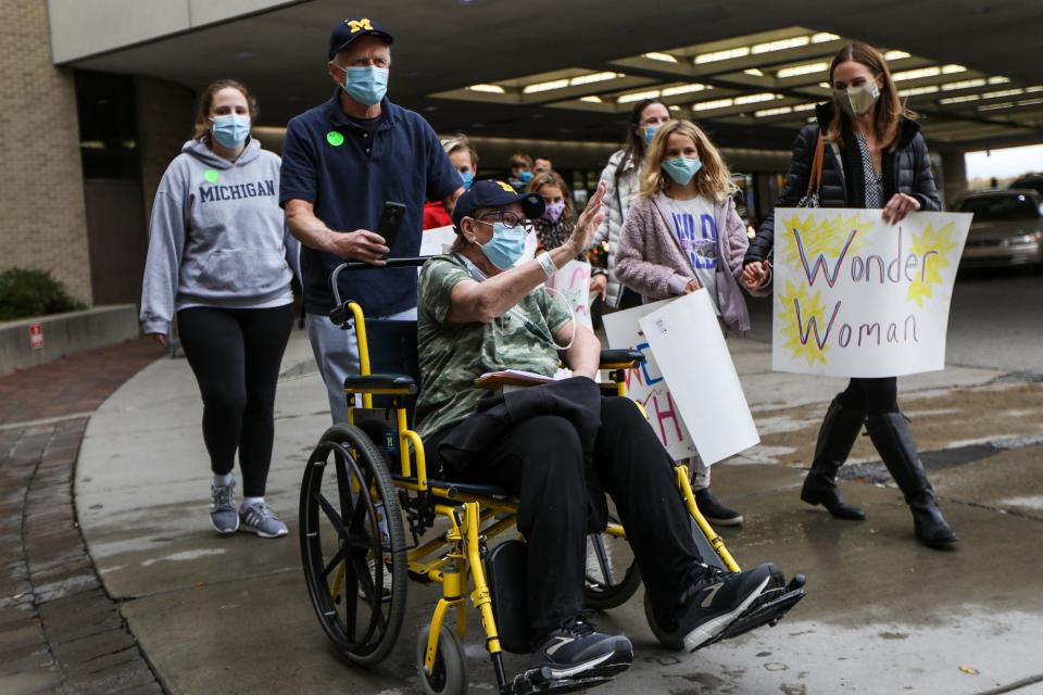 On Thursday morning, Oct. 15th, 2020, Deanna Hair is discharged from the University of Michigan hospital in Ann Arbor, Mich. with help from her husband, Ken Hair, who pushes her in a wheelchair after being there for 196 days battling COVID (She was admitted on April 2nd).