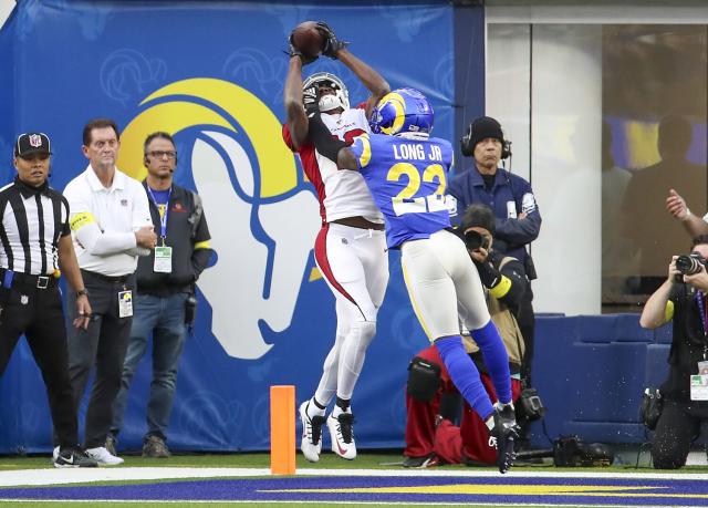 McCoy leads Cards past Rams 27-17; Cooper Kupp injured