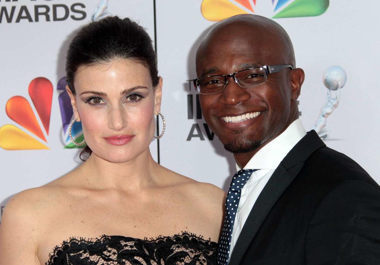 Idina Menzel (L) and actor Taye Diggs arrive at the 43rd NAACP Image Awards held at The Shrine Auditorium on February 17, 2012 in Los Angeles, California