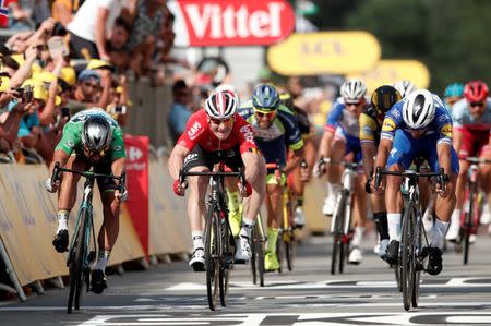 Cycling - Tour de France - The 195-km Stage 4 from La Baule to Sarzeau - July 10, 2018 - Quick-Step Floors rider Fernando Gaviria of Colombia wins the stage, ahead of BORA-Hansgrohe rider Peter Sagan of Slovakia and Lotto Soudal rider Andre Greipel of Germany. REUTERS/Benoit Tessier