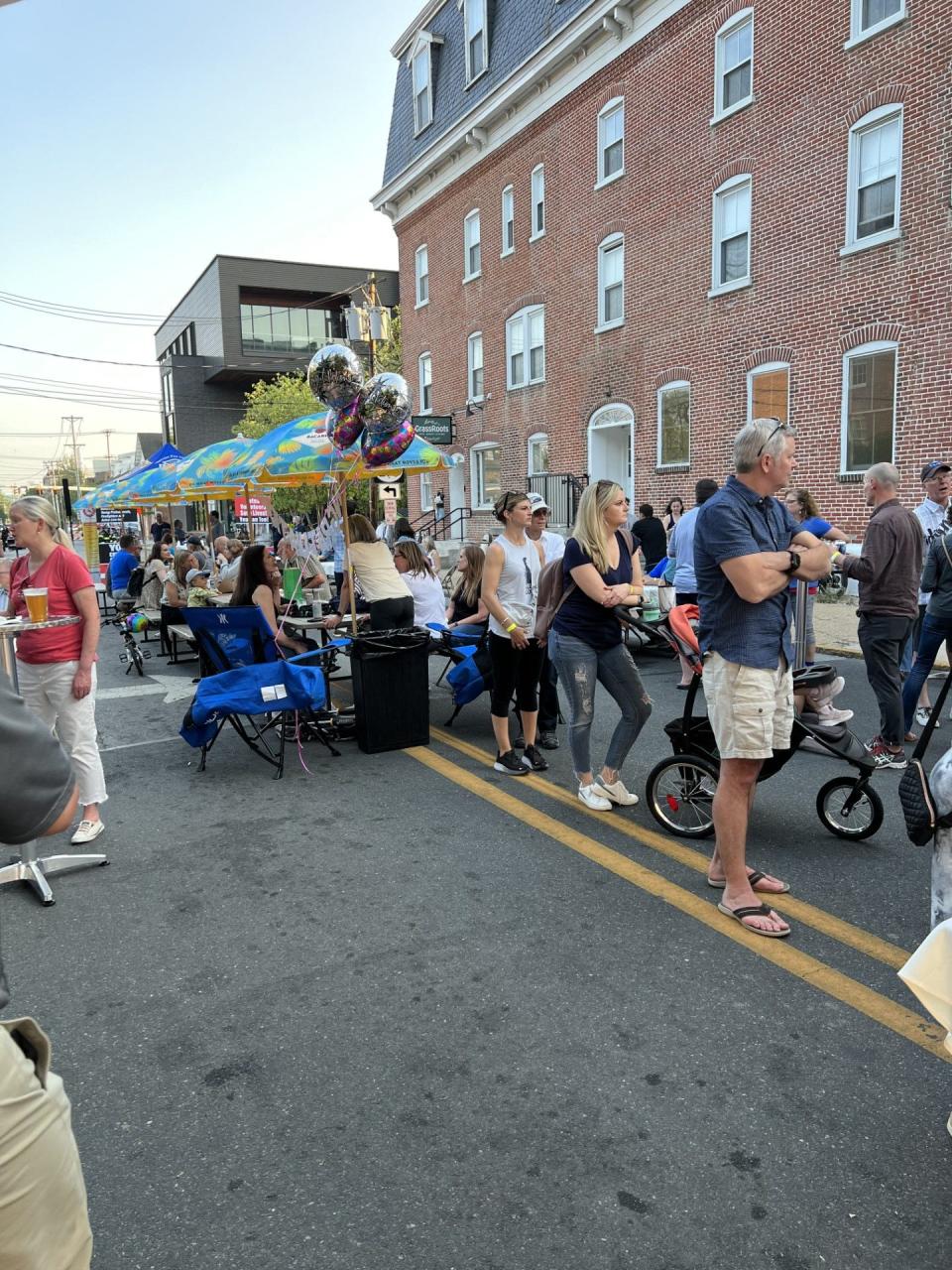 Locals came out to a beer garden event on Academy Street earlier this summer, hosted by Hamilton's on Main.