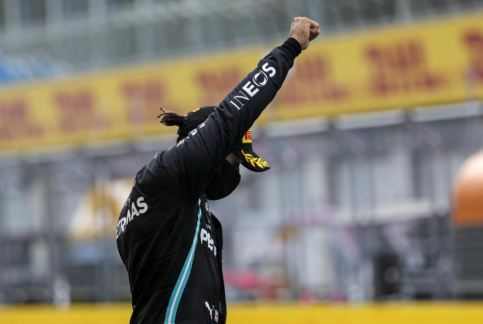 Mercedes driver Lewis Hamilton of Britain reacts on the podium after winning the Styrian Formula One Grand Prix race at the Red Bull Ring racetrack in Spielberg, Austria, Sunday, July 12, 2020. (Leonhard Foeger/Pool via AP)