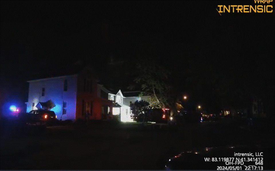 This Fremont Police Department bodycam photo was taken at approximately 10 p.m. Wednesday, May 1, 2024, at the end of what became a 6-hour standoff. The boxy vehicle at 508 S. Wood St. is the Sandusky County Special Response Team vehicle.