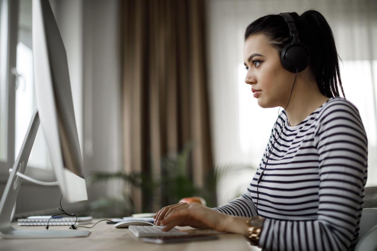 Young woman working at home