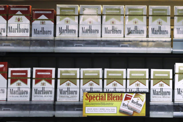 Marlboro maker cuts profit forecast as smokers swap to cheaper