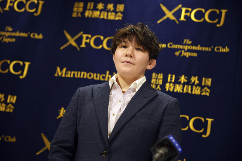 Rina Gonoi, former member of the Japan Ground Self-Defense Forces, prepares to attend the press conference at the Foreign Correspondents' Club of Japan, Wednesday, Dec. 13, 2023, in Tokyo. A Japanese court on Tuesday convicted three former soldiers in a sexual assault case that authorities had dropped until Gonoi came forward demanding a reinvestigation and prompting a military-wide harassment probe. (AP Photo/Eugene Hoshiko)