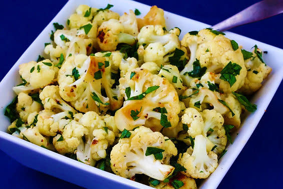 <strong>Get the <a href="http://www.gimmesomeoven.com/garlic-roasted-cauliflower/" target="_blank">Garlic Roasted Cauliflower Recipe</a> by Gimme Some Oven</strong>