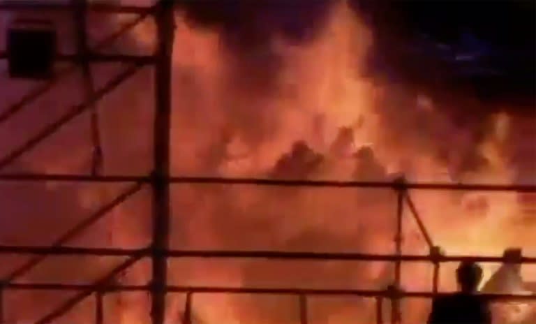 Frame grab from video footage provided by Apple Daily from reader Miss Huang of revelers being engulfed by flames at the Formosa Fun Coast water park in Pali district, in New Taipei City, on June 27, 2015