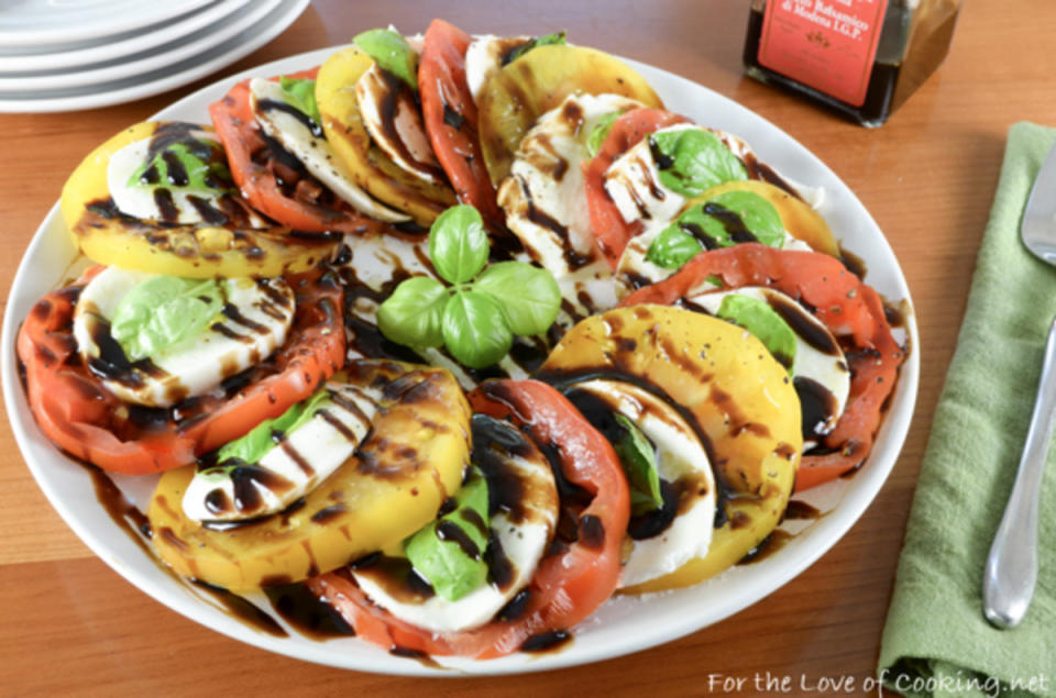 <p>For the Love of Cooking</p><p>Caprese salad ranks high as one of the best ways to get your fill of summer tomatoes. </p><p><strong>Get the recipe:</strong> <a href="http://www.fortheloveofcooking.net/2017/07/heirloom-caprese-salad-with-balsamic-reduction.html" rel="nofollow noopener" target="_blank" data-ylk="slk:Heirloom Caprese Salad with Balsamic Reduction;elm:context_link;itc:0;sec:content-canvas" class="link "><strong>Heirloom Caprese Salad with Balsamic Reduction</strong></a></p>