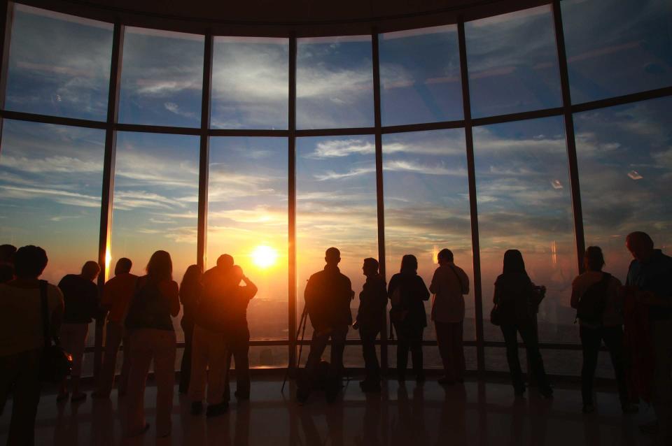 19 January 2010 - Dubai, UAE - Sunset from the observation deck on the 124th floor of the Burj Kalifah Tower. Photo Credit: Gabriela Maj/Sipa Press/1001202123