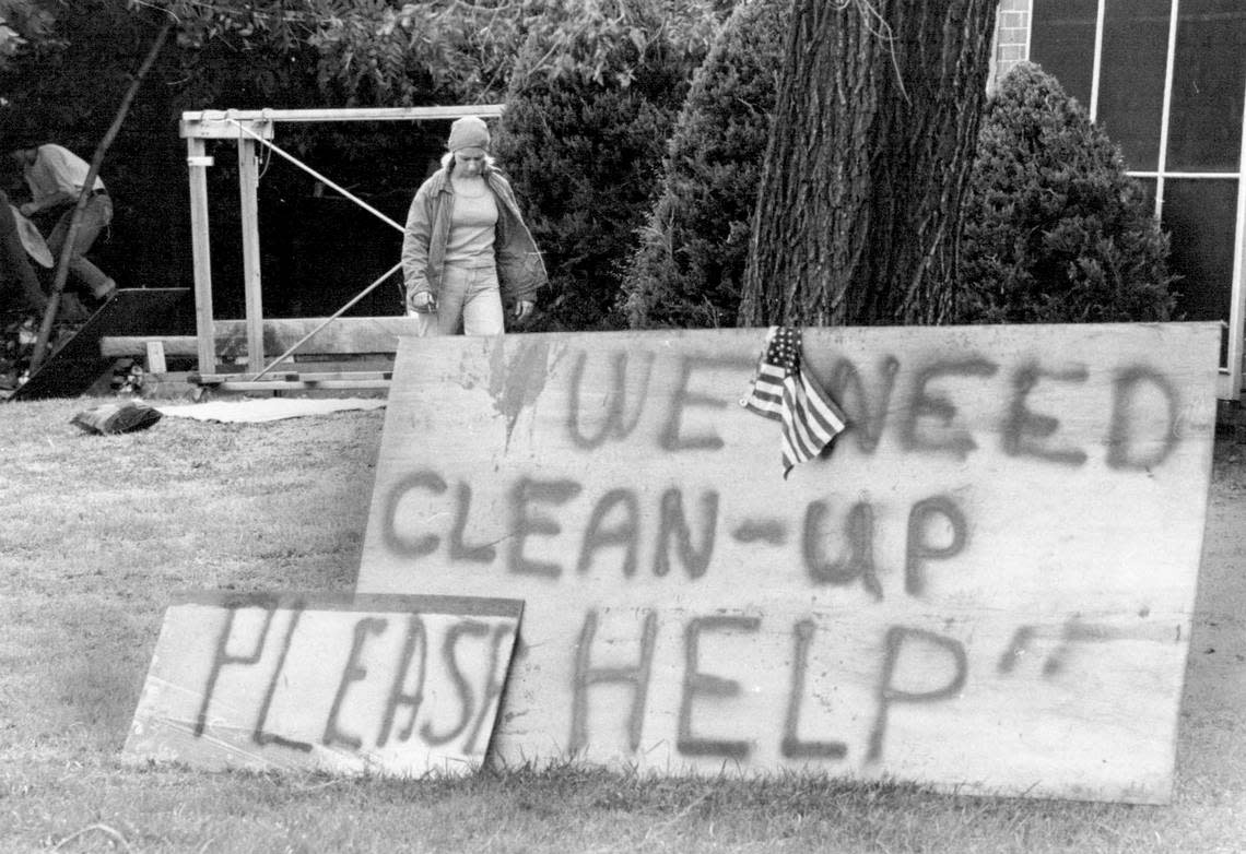 Neighborhood clean-up after the 1977 flood.