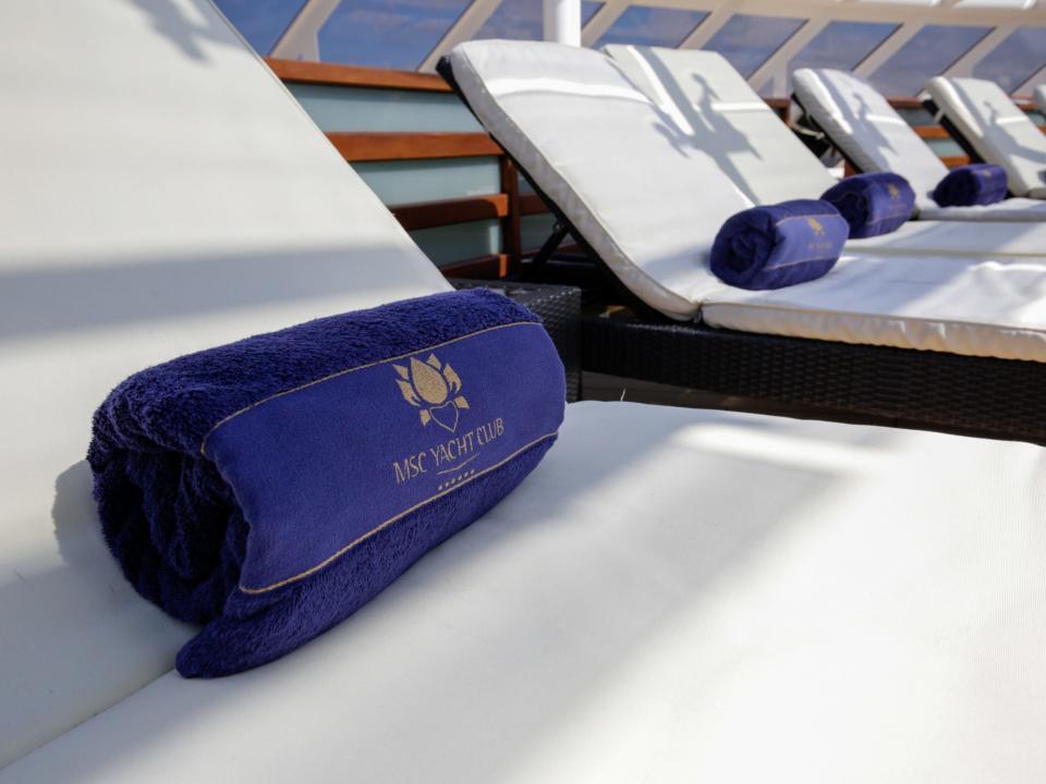 A towel for MSC Yacht Club members in the MSC Meraviglia