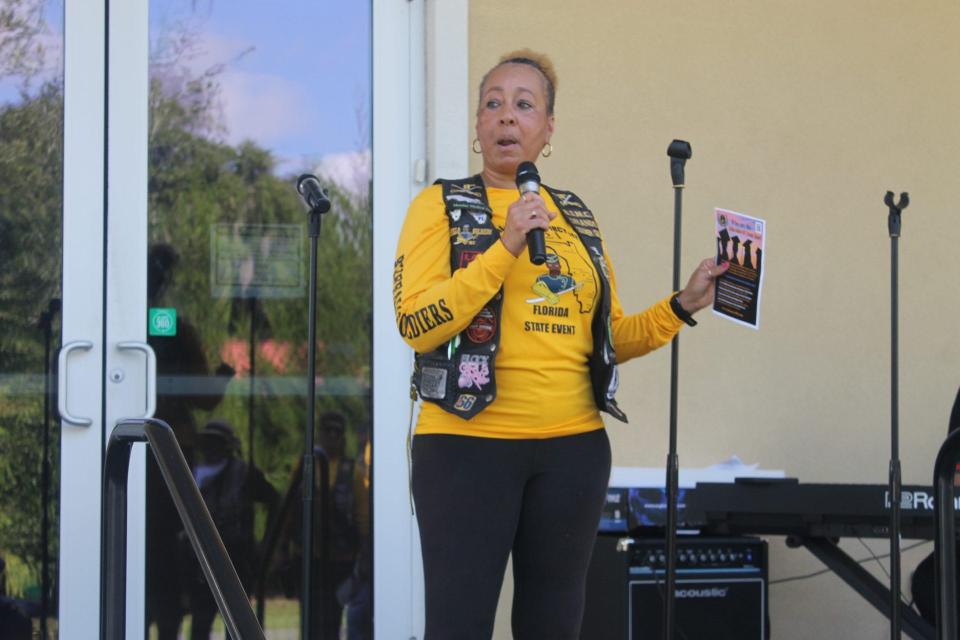 Paula "Soldier Girl" Edwards, chaplain of the Orlando chapter of the Buffalo Soldiers and Troopers Motorcycle Club, speaks during the Fight Against Gun Violence event held Saturday at DaySpring Baptist Church in NE Gainesville.
(Credit: Photo by Voleer Thomas/For The Guardian)