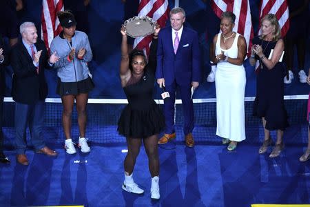 Sep 8, 2018; New York, NY, USA; Serena Williams of the United States poses with the finalist trophy after the women's final against Naomi Osaka of Japan on day thirteen of the 2018 U.S. Open tennis tournament at USTA Billie Jean King National Tennis Center. Danielle Parhizkaran-USA TODAY SPORTS
