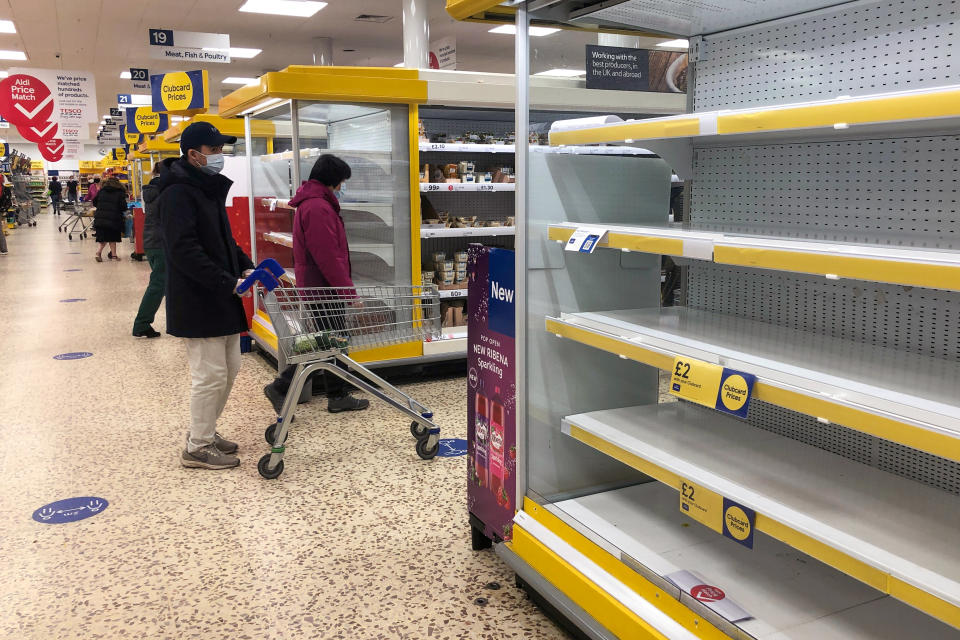 Bare shelves at a Tesco superstore in Cambridge, ahead of a national lockdown for England from Thursday. (Photo by Joe Giddens/PA Images via Getty Images)