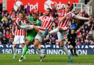 Britain Football Soccer - Stoke City v Sunderland - Barclays Premier League - The Britannia Stadium - 30/4/16 Sunderland's Jermain Defoe in action with Stoke's Erik Pieters and Ryan Shawcross Reuters / Darren Staples Livepic