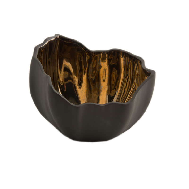 <a rel="nofollow noopener" href="https://katharinepooley.com/boutique/shop/accessories/garbo-copper/" target="_blank" data-ylk="slk:Garbo Copper Porcelain Bowl, Katharine Pooley, $283“For fall, I love a masculineTom Ford-inspired black or dark navy accessory—they add depth and understated glamour to a scheme. They're best combined with geometric and faceted shapes and tactile finishes like leather and shagreen.”;elm:context_link;itc:0;sec:content-canvas" class="link ">Garbo Copper Porcelain Bowl, Katharine Pooley, $283<p>“For fall, I love a masculineTom Ford-inspired black or dark navy accessory—they add depth and understated glamour to a scheme. They're best combined with geometric and faceted shapes and tactile finishes like leather and shagreen.”</p> </a>