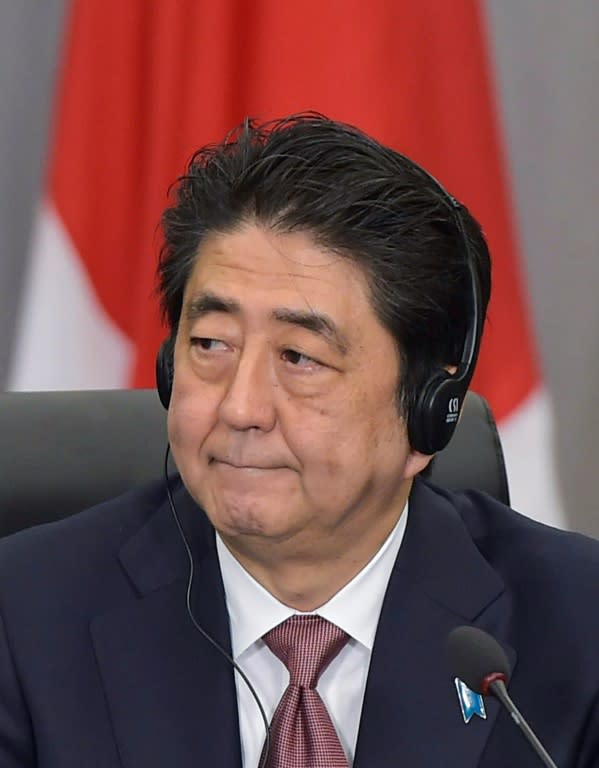 Japan's Prime Minister Shinzo Abe (pictured) says he wants to push through a huge trans-Pacific trade deal that has been attacked by both Democratic presidential candidates, Bernie Sanders and Hillary Clinton