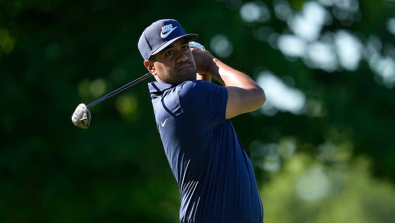 Tony Finau watches his shot from the fifth tee during the second round of the Memorial golf tournament, Friday, June 7, 2024, in Dublin, Ohio.