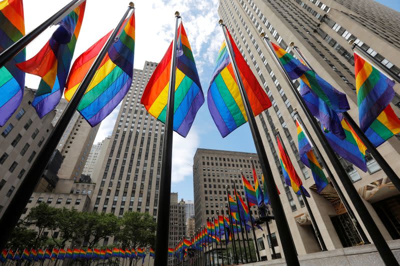 Rainbow flags fly at Rockefeller Center in midtown Manhattan in support of the LGBT community in New York