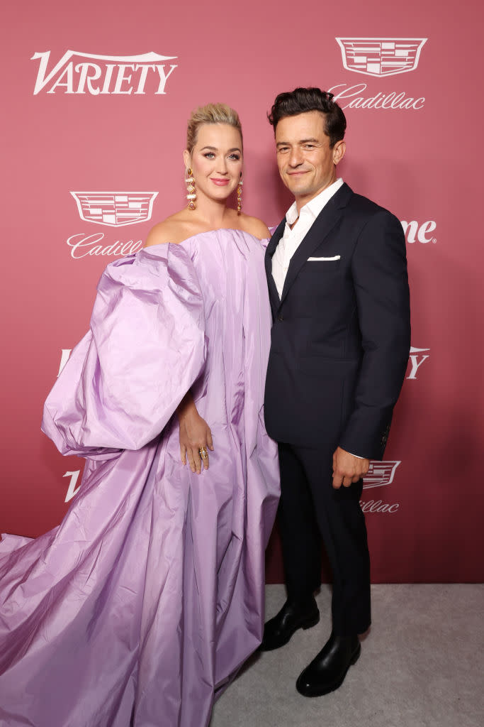 Katy Perry described Orlando Bloom as her 'hero' after he loosened her corset when she suffered a wardrobe malfunction at Variety's Power of Women in September 2021. (Getty Images)