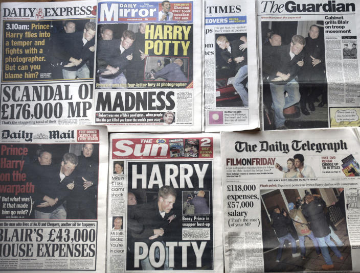 FILE - In this Friday, Oct. 22, 2004 file photo, a montage of the front pages of Britain's national newspapers where photos of Prince Harry's altercation with a photographer outside a central London night spot, in the early hours of Thursday morning, dominated. Princess Diana’s little boy, the devil-may-care red-haired prince with the charming smile is about to become a father. The arrival of the first child for Prince Harry and his wife Meghan will complete the transformation of Harry from troubled teen to family man, from source of concern to source of national pride. (AP Photo/Adam Butler, File)