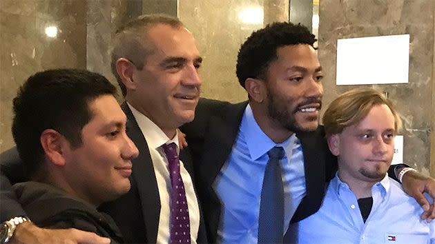 Rose poses with jurors after the 'not guilty' verdict. Pic: Twitter @jon_greenberg