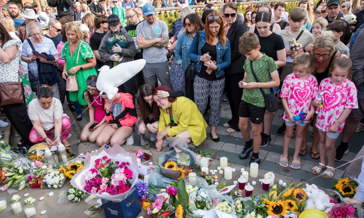 <span>People attend a vigil in Southport on Tuesday for the victims of the attack.</span><span>Photograph: Gary Calton/The Observer</span>