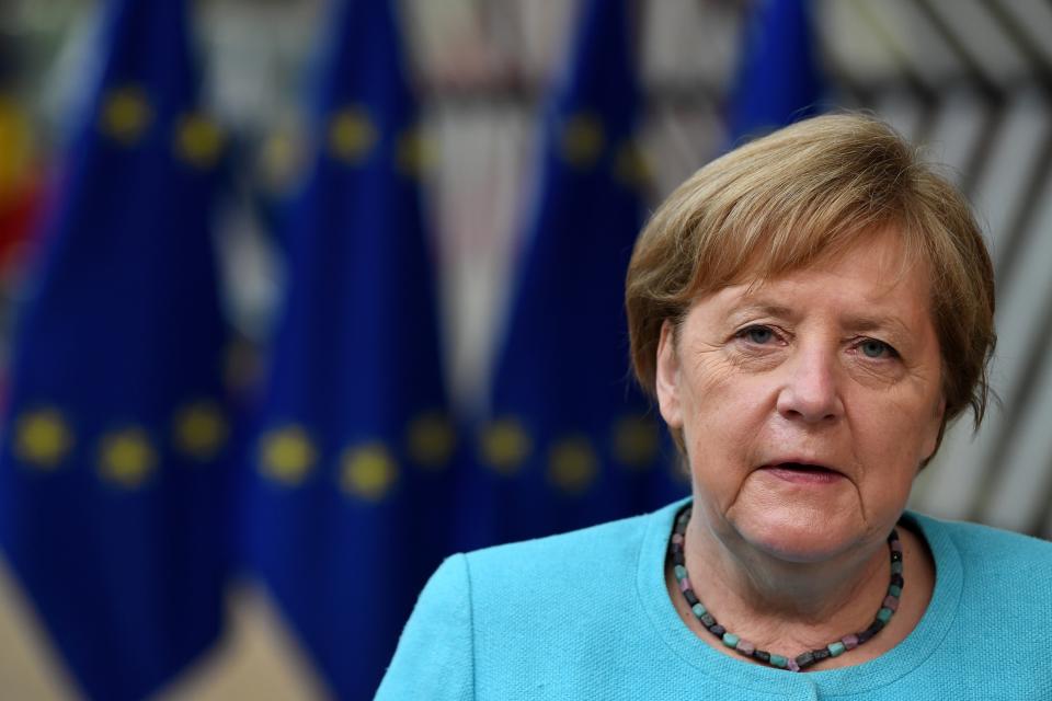 Germany's Chancellor Angela Merkel talks to journalists during an EU summit at the European Council building in Brussels, Thursday, June 24, 2021. At their summit in Brussels, EU leaders are set to take stock of coronavirus recovery plans, study ways to improve relations with Russia and Turkey, and insist on the need to develop migration partners with the countries of northern Africa, but a heated exchange over a new LGBT bill in Hungary is also likely. (John Thys, Pool Photo via AP)