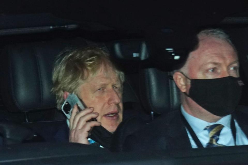 Prime Minister Boris Johnson rides in the back seat of a Government car (Victoria Jones/PA) (PA Wire)