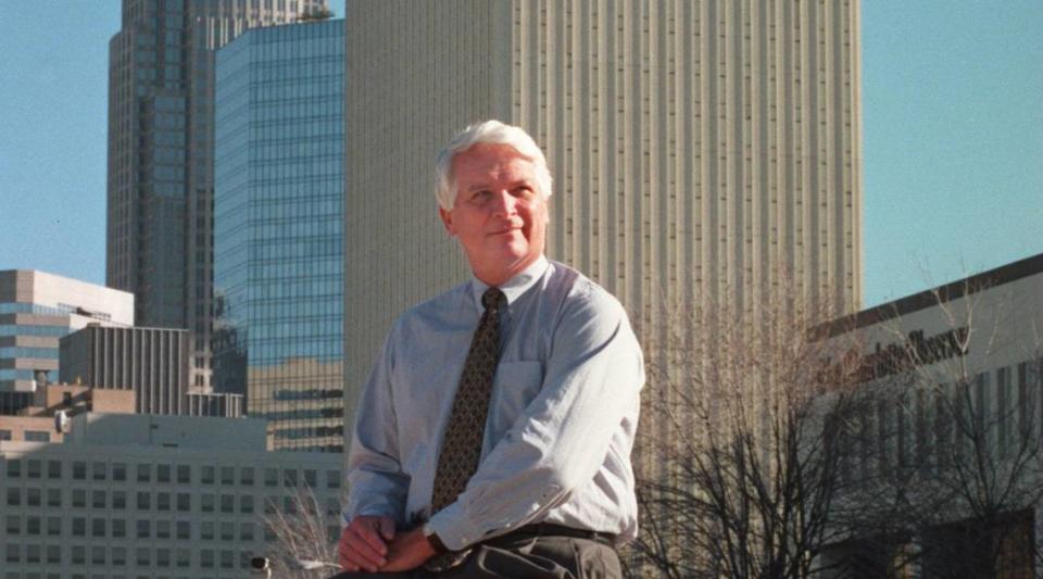 Rolfe Neill is shown here in December 1997, shortly before retiring as publisher. GAYLE SHOMER/© CHARLOTTE OBSERVER