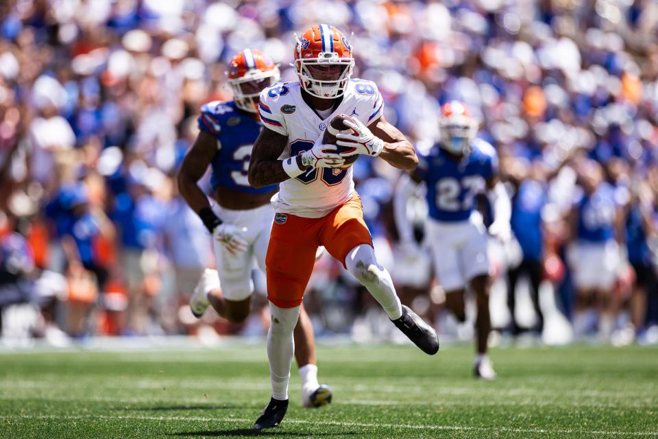 Florida Gators wide receiver Marcus Burke (88) makes a catch during the first half at the Orange and Blue spring football game at Steve Spurrier Field at Ben Hill Griffin Stadium in Gainesville, FL on Saturday, April 13, 2024. [Matt Pendleton/Gainesville Sun]