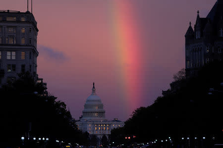 A rainbow forms over the U.S. Capitol as evening sets on midterm Election Day in Washington, U.S. November 6, 2018. REUTERS/Jonathan Ernst