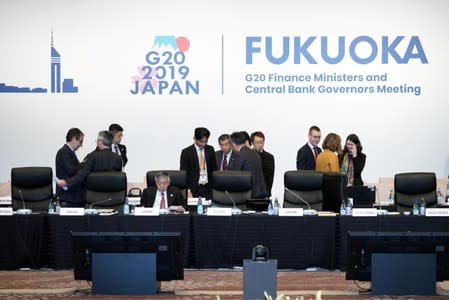 Bank of Japan Governor Haruhiko Kuroda and other participants prepare to attend the G20 finance ministers and central bank governors meeting, in Fukuoka